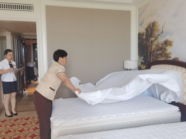 5.长白山酒店家人跟岗学习规范工作流程.jpg 5.长白山酒店家人跟岗学习规范工作流程.jpg